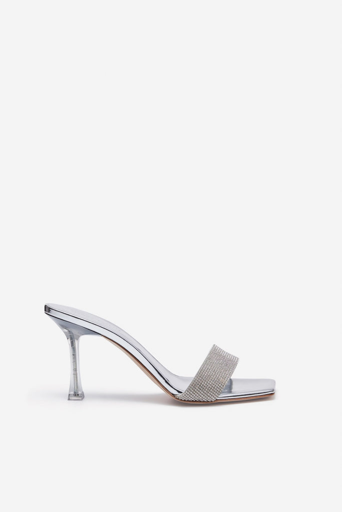 The Crystal Mules by Magda Butrym are updated signature sandals with a crystal embellished strap