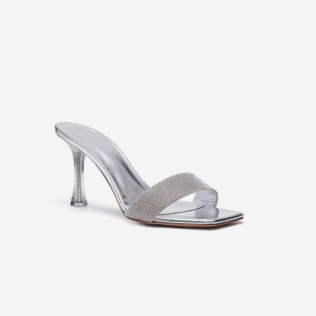 The Crystal Mules by Magda Butrym are updated signature sandals with a crystal embellished strap