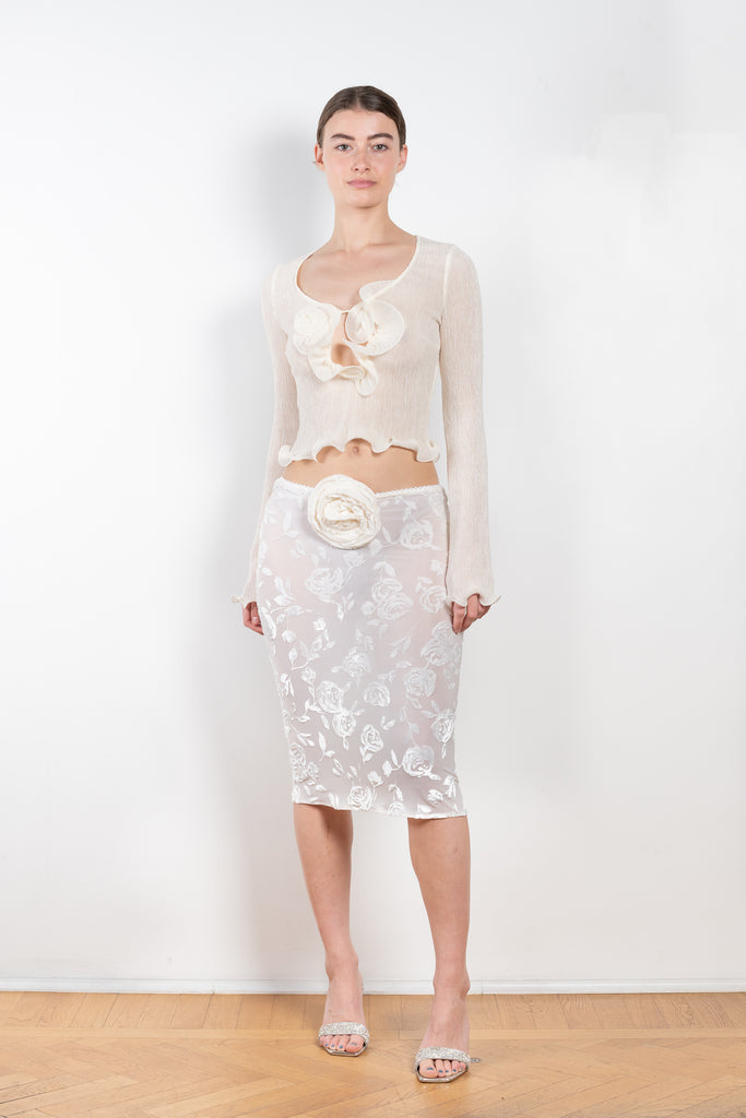The Floral Devore Skirt 03 by Magda Butrym is a simple low waist midi skirt with a straight and relaxed shape in a delicate floral print devore with a detachable flower