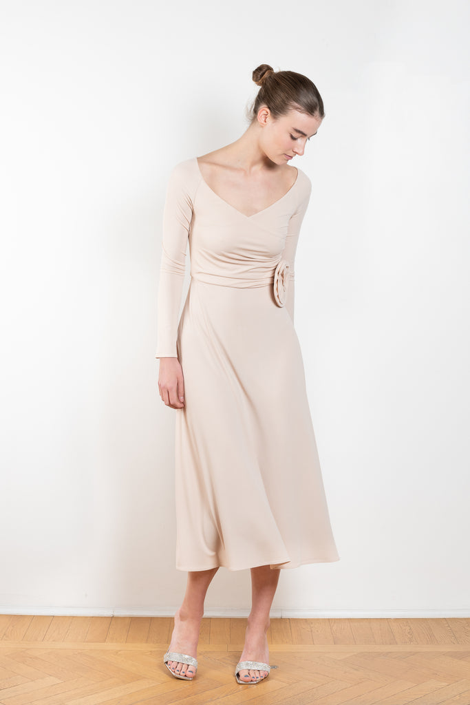 The Jersey Wrap Dress 21 by Magda Butrym is an elegant wrap dress with a v neck ballerina neckline, long off the shoulder sleeves, and an a-line midi skirt