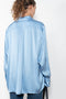 The Silk Shirt by Magda Butrym is a classic button down blouse done in silk with a flowy silhouette