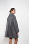 The Bandana Trench by Meryll Rogge is a trench coat crafted in trench cotton, featuring a bandana collar, raglan sleeves and a button closure.