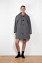 The Bandana Trench by Meryll Rogge is a trench coat crafted in trench cotton, featuring a bandana collar, raglan sleeves and a button closure.