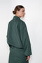 The Bomber Jacket by Meryll Rogge crafted in trench cotton, featuring a zip closure, drawstring hem, chest pocket and woven logo label
