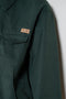 The Bomber Jacket by Meryll Rogge crafted in trench cotton, featuring a zip closure, drawstring hem, chest pocket and woven logo label