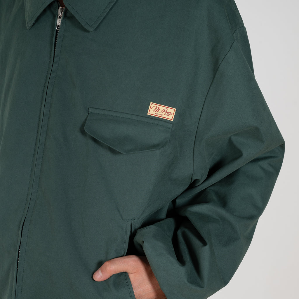 The Bomber Jacket by Meryll Rogge crafted in trench cotton, featuring a zip closure, drawstring hem, chest pocket and woven logo label