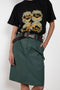 The Chino Pencil Skirt by Meryll Rogge is a unique pencil skirt with a workwear-like silhouette. With XL loop belts and side pockets