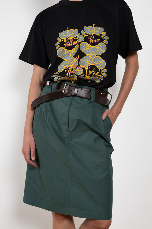 The Chino Pencil Skirt by Meryll Rogge is a unique pencil skirt with a workwear-like silhouette. With XL loop belts and side pockets