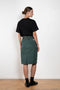 The Chino Pencil Skirt by Meryll Rogge is a unique pencil skirt with a workwear-like silhouette. With XL loop belts and side pockets