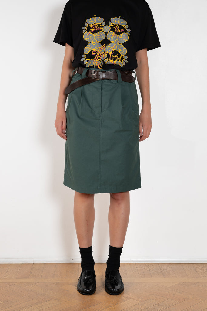 The Chino Pencil Skirt by Meryll Rogge is a unique pencil skirt with a workwear-like silhouette. With XL loop belts and side pockets
