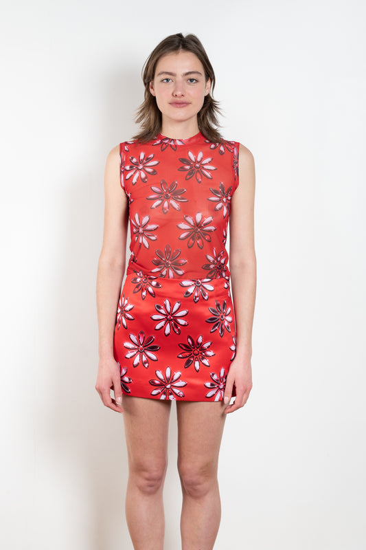 The Daisy Mesh Top by Meryll Rogge is a fitted sleeveless top in a daisy print mesh.