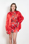 The Daisy Scuba Mini Skirt by Meryll Rogge is a fitted short skirt in a floral embroidery scuba fabric