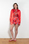 The Daisy Scuba Mini Skirt by Meryll Rogge is a fitted short skirt in a floral embroidery scuba fabric