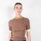 The Fine Knit Top by Meryll Rogge is a fitted top with a mock neck and color block details in a fine ribbed knit