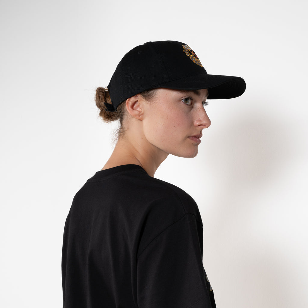 The Follow your heart Cap by Meryll Rogge crafted in cotton twill, in black, featuring multicolour 'Meryll Rogge' embroidery.