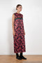 The Long Shift Dress by Meryll Rogge is a sleeveless shift dress crafted in floral scuba satin, featuring a round neckline and a contrasting ribbon detail.