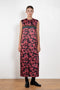 The Long Shift Dress by Meryll Rogge is a sleeveless shift dress crafted in floral scuba satin, featuring a round neckline and a contrasting ribbon detail.