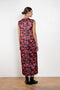 The Long Shift Dress by Meryll Rogge is a sleeveless shift dress crafted in floral scuba satin, featuring a round neckline and a contrasting ribbon detail.
