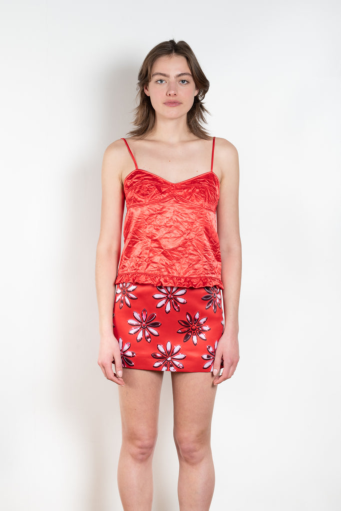 The Ruffle Slip Top by Meryll Rogge is a delicate top with a sweetheart neckline, fine straps and a ruffle hem