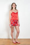 The Ruffle Slip Top by Meryll Rogge is a delicate top with a sweetheart neckline, fine straps and a ruffle hem