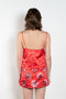 The Ruffle Slip Top by Meryll Rogge is a delicate top with a sweetheart neckline, fine straps and a ruffle hem