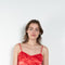 The Ruffle Slip Top by Meryll Rogge is a delicate top with a sweetheart neckline, fine straps and a ruffle hem