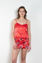 The Ruffle Slip Top by Meryll Rogge is a delicate top with a sweetheart neckline, fine straps and a ruffle hem