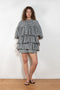 The Short Ruffle Dress by Meryll Rogge is a short dress with a vichy print and cute ruffles