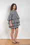 The Short Ruffle Dress by Meryll Rogge is a short dress with a vichy print and cute ruffles