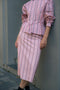 The Slip Skirt by Meryll Rogge is crafted in striped nylon silk, featuring a midi length and a straight silhouette.