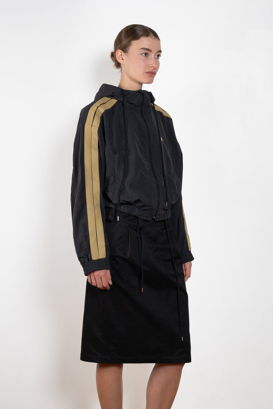 The Sporty Jacket by Meryll Rogge crafted in nylon, featuring a hood, contrast stripe panels, drawstring details and a zip closure