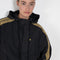 The Sporty Jacket by Meryll Rogge crafted in nylon, featuring a hood, contrast stripe panels, drawstring details and a zip closure