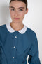 The Waisted Shirt by Meryll Rogge is a long-sleeved waisted shirt crafted in printed cotton, featuring a club collar and a fitted silhouette.