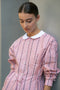 The Waisted Shirt by Meryll Rogge is a long-sleeved waisted shirt crafted in printed cotton, featuring a club collar and a fitted silhouette.