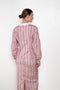 The Waisted Shirt by Meryll Rogge is a long-sleeved waisted shirt crafted in printed cotton, featuring a club collar and a fitted silhouette.