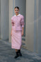The Waisted Shirt by Meryll Rogge is a long-sleeved waisted shirt crafted in printed cotton, featuring a club collar and a fitted silhouette.