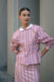 The Waisted Shirt by Meryll Rogge is a long-sleeved waisted shirt crafted in printed cotton, featuring a club collar and a fitted silhouette.