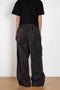 The Workwear Drawstring Chino by Meryll Rogge crafted in grey/black/red checked cotton, featuring a wide-leg silhouette and turned-up hems.