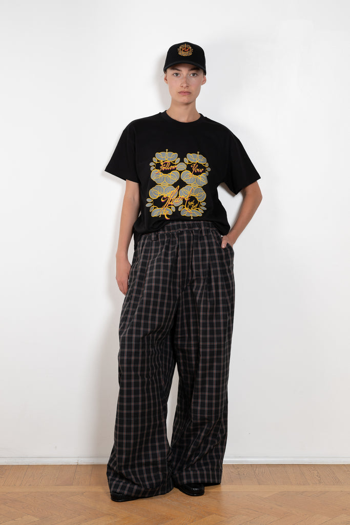 The Workwear Drawstring Chino by Meryll Rogge crafted in grey/black/red checked cotton, featuring a wide-leg silhouette and turned-up hems.