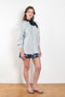 The Boule Shirt by Meryll Rogge is a loose shirt with a contrasted black tie collar