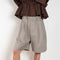 The Drawstring Chino Shorts by Meryll Rogge is a signature oversized short with a drawstring closure
