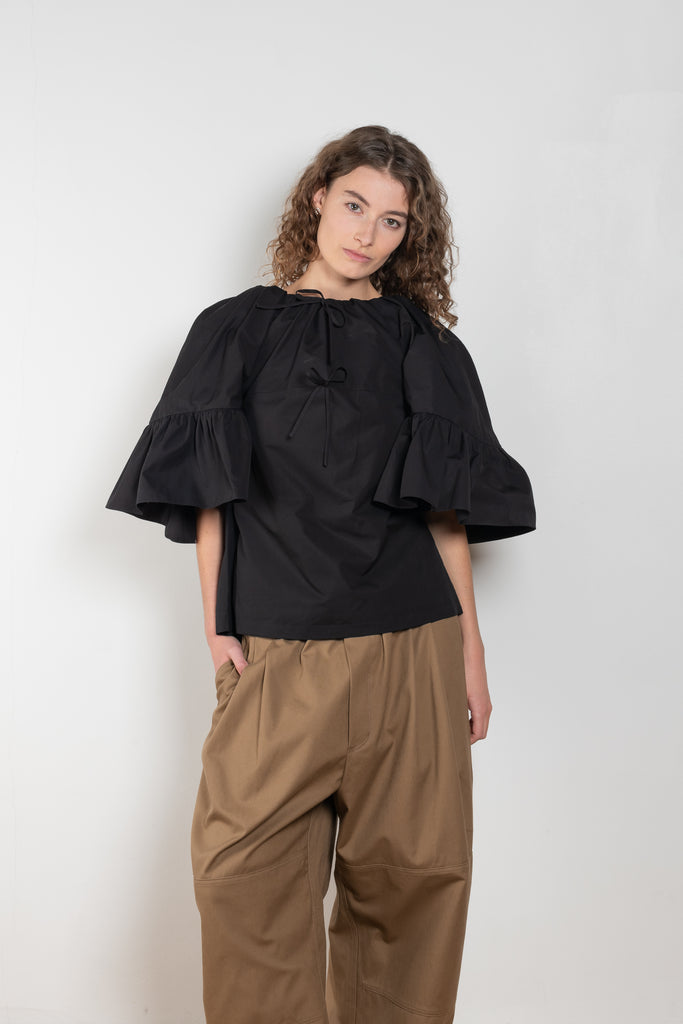 The Workwear Chino by Meryll Rogge is a signature oversized trouser with a drawstring closure