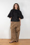 The Workwear Chino by Meryll Rogge is a signature oversized trouser with a drawstring closure