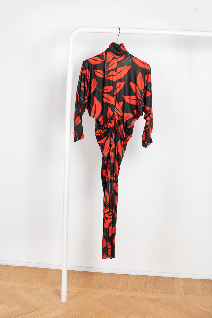 The Printed Dress by Meryll Rogge is a long sleeve dress with a sensual deep V open back in a soft and flowy viscose leaf print
