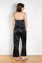 The Ruffle Pant by Meryll Rogge is a low waist trouser wit a drawstring closure and a ruffle hem