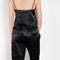 The Ruffle Pant by Meryll Rogge is a low waist trouser wit a drawstring closure and a ruffle hem