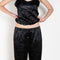 The Ruffle Pant by Meryll Rogge is a low waist trouser wit a drawstring closure and a ruffle hem