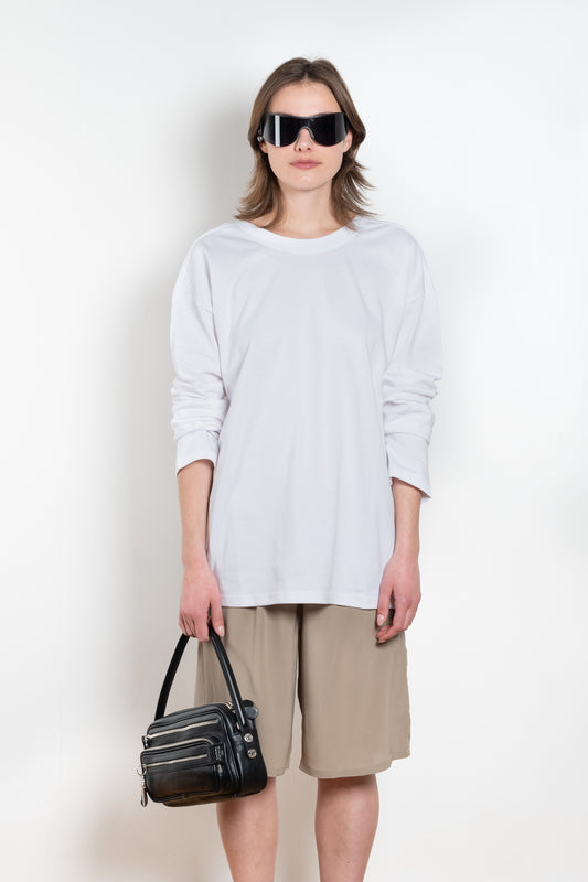 The TShirt 1990 by Monique Van Heist is a loose fitted lightweight sweat tshirt with a delicate open back detail