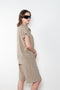 The Lily Top by Monique Van Heist is a short sleeved silk top with a buttoned mao collar