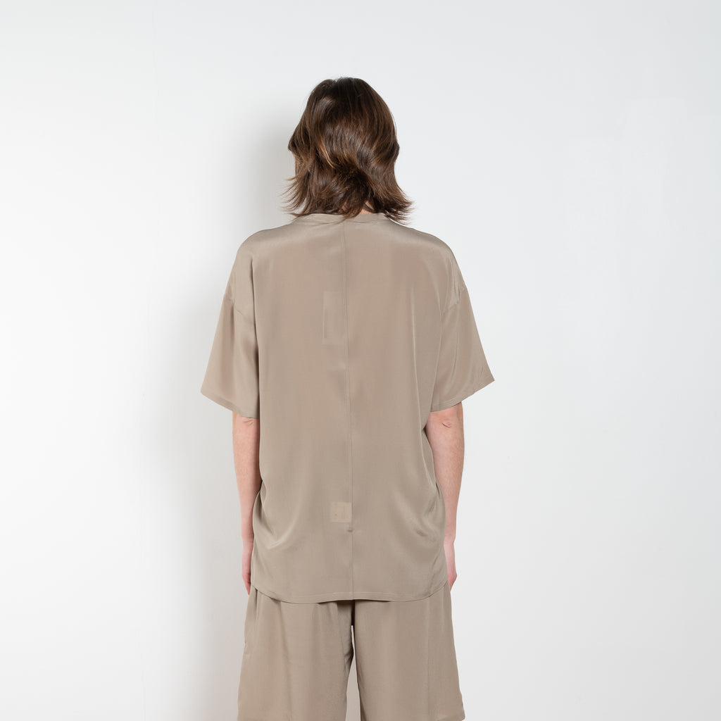 The Lol Mini Short Sleeve Top by Monique Van Heist is a short sleeved silk top with a round collar